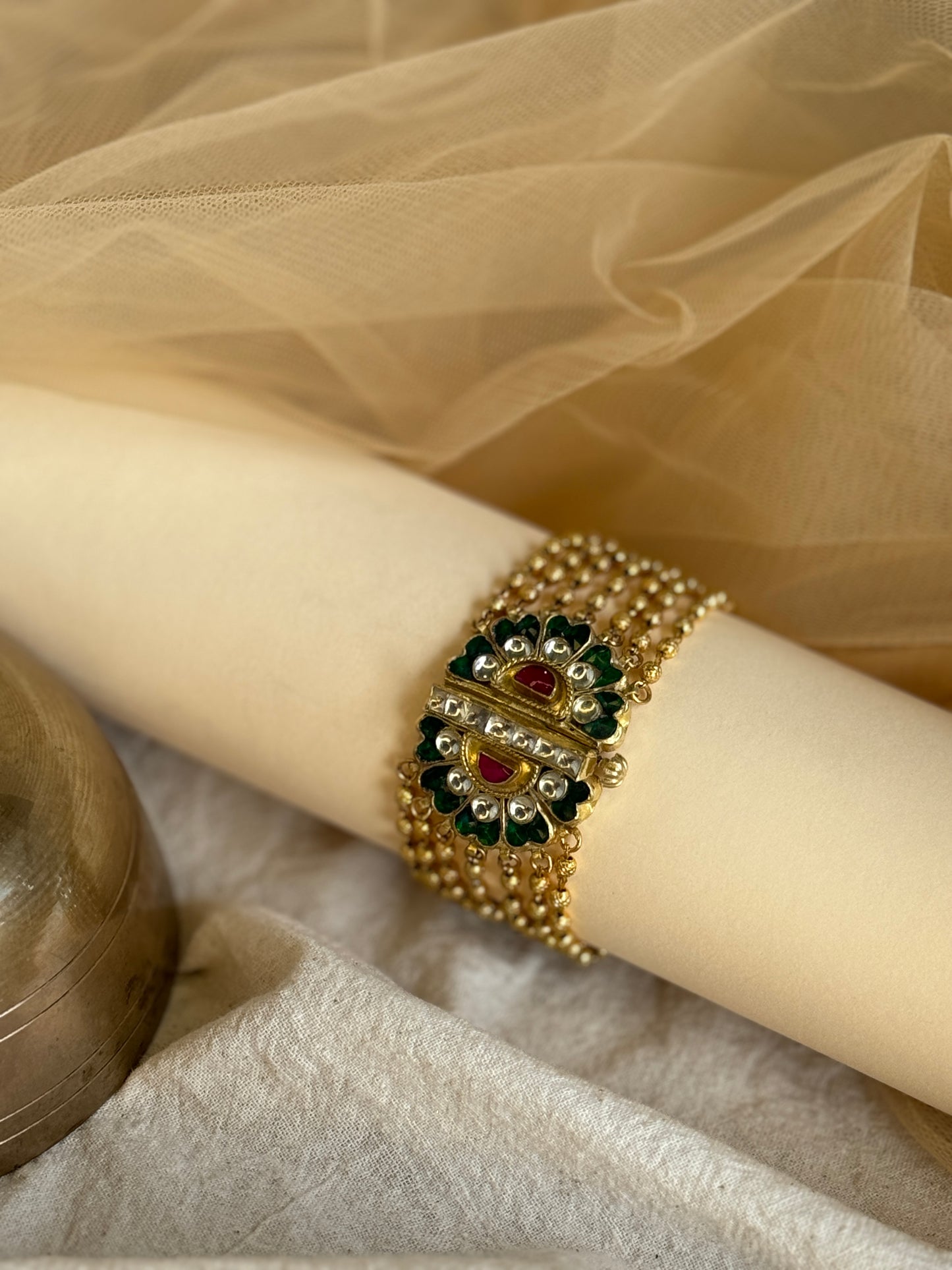 Gold round bead 7 strands bracelet with jadua flower