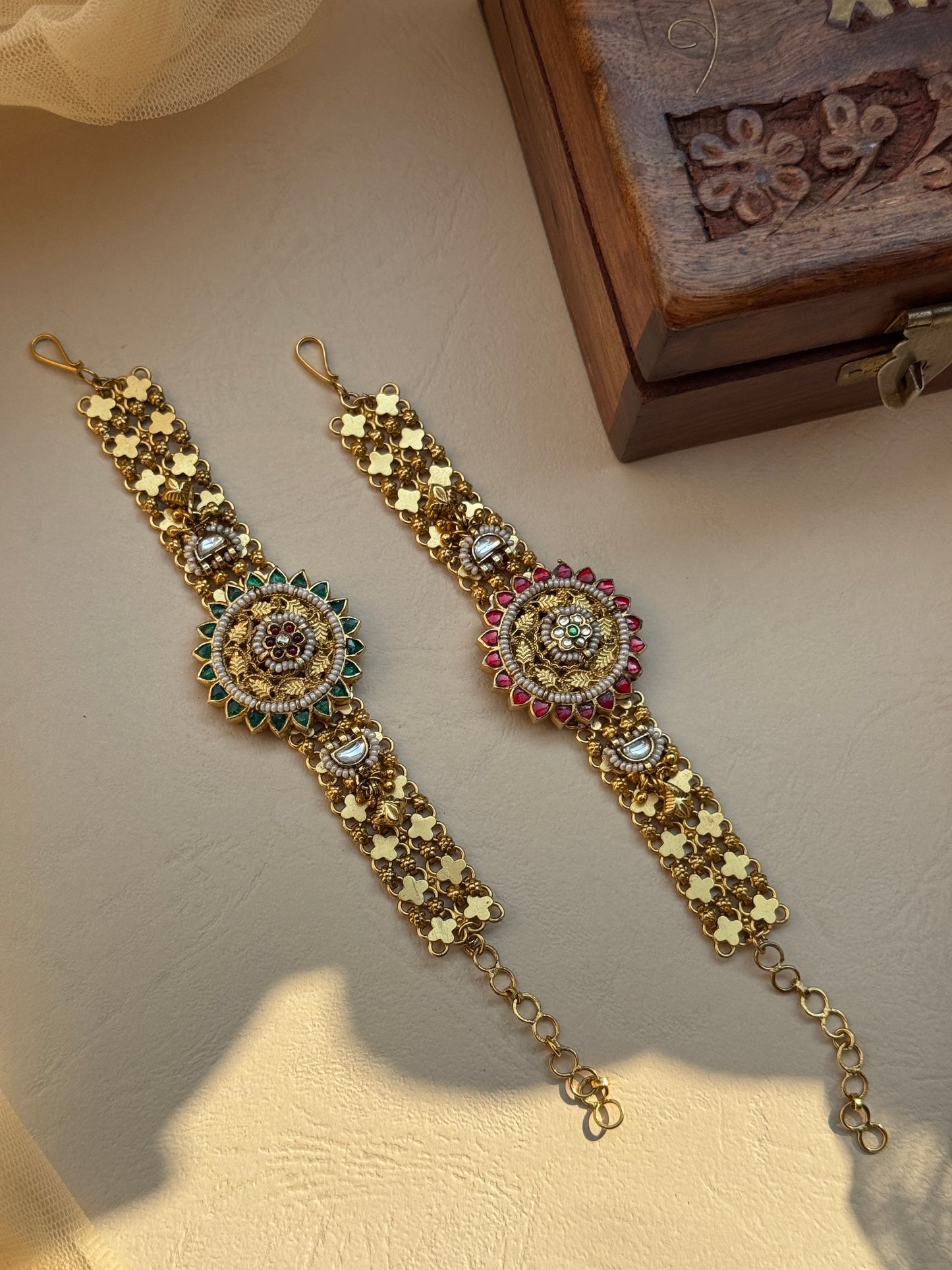 Gold plating charm and bead linked bracelet with center flower motif