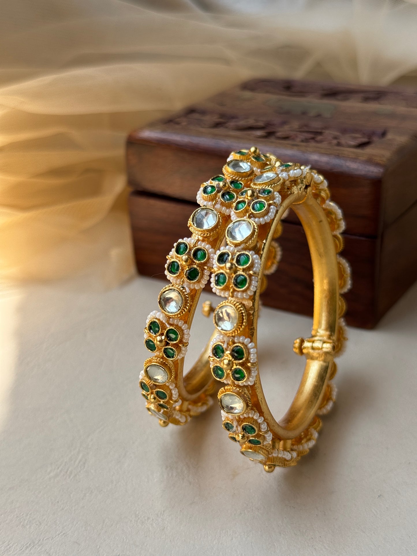 Gold plated Kangan with pearl and jadau design