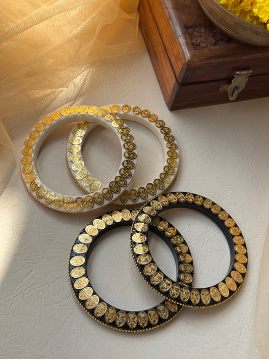 A Set of Bangles with Gold plating coin motif design