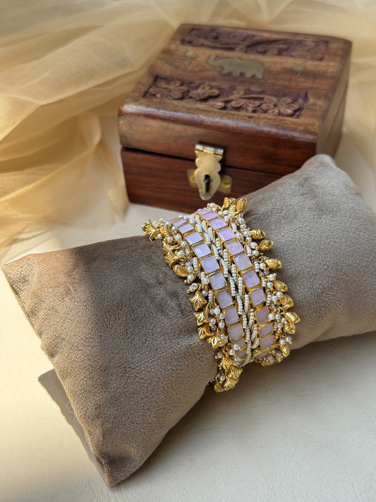 Square stone studded kangan with flower shape charm edges