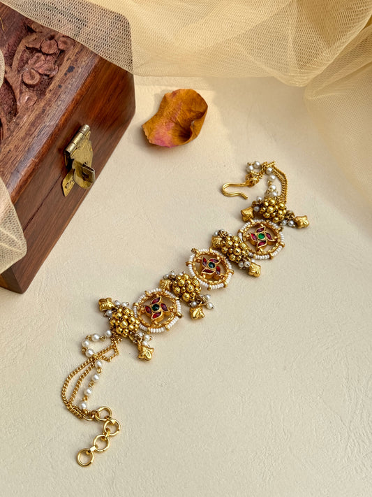 Heritage round motif Bracelt in gold plating
