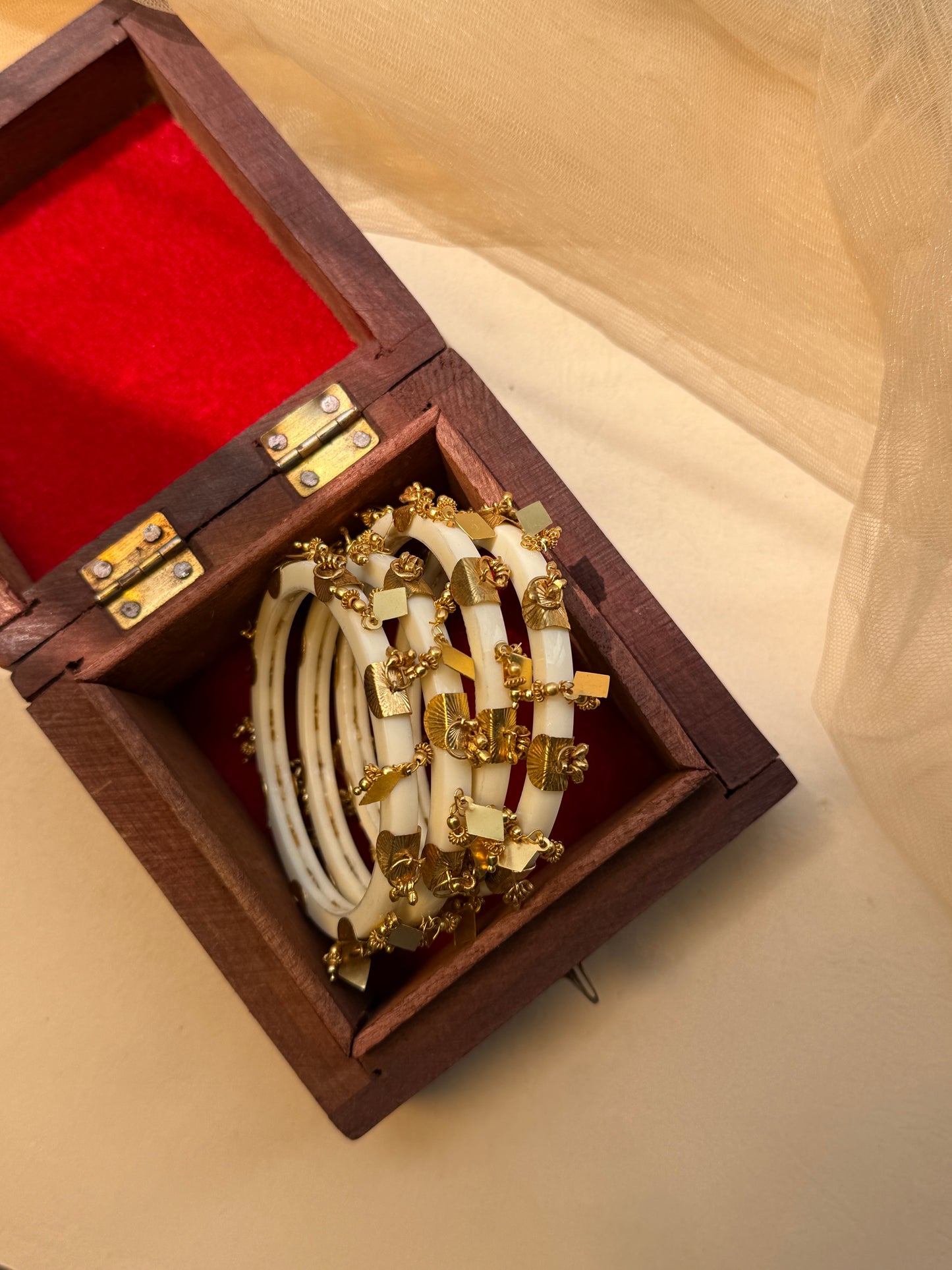 TINKLE BANGLES SET OF FOUR PIECES